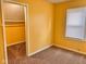 Bedroom featuring a closet space and window for natural lighting at 624 N Rural St, Indianapolis, IN 46201
