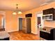 Kitchen with wood flooring and stainless steel appliances at 624 N Rural St, Indianapolis, IN 46201
