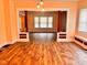Living room with hardwood floors and decorative columns at 624 N Rural St, Indianapolis, IN 46201