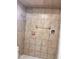 Well-kept shower with tile walls, shower head, and sleek fixtures at 624 N Rural St, Indianapolis, IN 46201