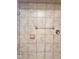 Tiled shower featuring a shower head, mounted soap dish and a towel rack at 624 N Rural St, Indianapolis, IN 46201