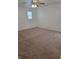 Bedroom featuring plush carpeting, one window, and neutral paint at 6368 Titania Dr, Indianapolis, IN 46236