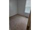 Bedroom featuring neutral carpet, and a window allowing for natural light at 6368 Titania Dr, Indianapolis, IN 46236