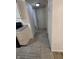 Tiled hallway leads from the kitchen to an outside door at 6368 Titania Dr, Indianapolis, IN 46236