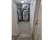 Utility room featuring a water heater, furnace, and tile floors at 6368 Titania Dr, Indianapolis, IN 46236