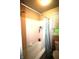 Compact bathroom featuring a shower-tub combo and window at 6601 Twin Brooks Dr, Indianapolis, IN 46227