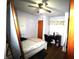 Cozy bedroom with desk and ceiling fan at 6601 Twin Brooks Dr, Indianapolis, IN 46227