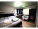 Bright main bedroom with hardwood floors and ample closet space at 6601 Twin Brooks Dr, Indianapolis, IN 46227