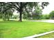 Green front yard with trees at 6601 Twin Brooks Dr, Indianapolis, IN 46227