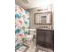 Bathroom with a dinosaur themed shower curtain and an elegant vanity at 6837 Littleton Dr, Indianapolis, IN 46221
