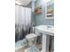 Bathroom featuring forest curtain, and pedestal sink at 6837 Littleton Dr, Indianapolis, IN 46221