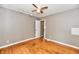 Bright bedroom with hardwood floors and track lighting at 706 University Blvd, Anderson, IN 46012