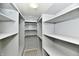 Walk-in closet with built-in shelving and ample storage space at 706 University Blvd, Anderson, IN 46012