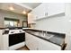 Functional kitchen equipped with essential appliances and ample counter space for meal preparation at 706 University Blvd, Anderson, IN 46012