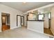 Bright living space boasting modern flooring and an open flow to adjacent rooms at 706 University Blvd, Anderson, IN 46012