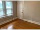 Bedroom with hardwood floors, natural light, and a closet at 730 N Riley Ave, Indianapolis, IN 46201