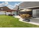 Expansive backyard with outdoor seating, pergola, patio, and lush lawn at 750 Trillium St, Lebanon, IN 46052