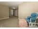 Bedroom featuring neutral walls, plush carpeting, and a rocking chair at 750 Trillium St, Lebanon, IN 46052