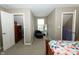Bedroom featuring neutral walls, plush carpeting, and a view into the closet at 750 Trillium St, Lebanon, IN 46052