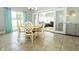 Dining room with sliding glass doors that open to the backyard and a seating area at 750 Trillium St, Lebanon, IN 46052