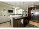 Spacious kitchen with a center island, stainless appliances, and an open layout at 750 Trillium St, Lebanon, IN 46052