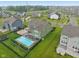 View of the backyard featuring a swimming pool with a patio area in a lush green lawn at 8165 Oakley Ter, Zionsville, IN 46077