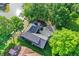 Aerial view of home with long driveway and landscaping, near a lake at 826 N Lanyard Dr, Cicero, IN 46034