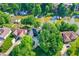 Overhead view of a waterfront house surrounded by lush trees and docks on the water at 826 N Lanyard Dr, Cicero, IN 46034