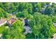 Scenic aerial view of a lakeside home with mature trees and well-maintained landscaping at 826 N Lanyard Dr, Cicero, IN 46034