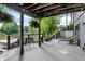 Outdoor living space with bar-style seating, lounge chairs, and lake views at 826 N Lanyard Dr, Cicero, IN 46034
