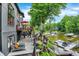 Multi-level backyard with deck, stairs, boat dock, lounge chairs, and lake access at 826 N Lanyard Dr, Cicero, IN 46034