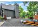 Expansive backyard featuring outdoor seating area with privacy landscaping, perfect for entertaining at 826 N Lanyard Dr, Cicero, IN 46034