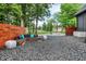 Relaxing backyard seating area with modern furniture, privacy fence, and a basketball hoop at 826 N Lanyard Dr, Cicero, IN 46034