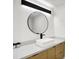 Modern bathroom featuring a vessel sink, wood cabinets, and sleek fixtures at 826 N Lanyard Dr, Cicero, IN 46034
