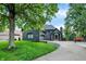 Charming home featuring a well-manicured lawn, brick facade, and an attached two-car garage at 826 N Lanyard Dr, Cicero, IN 46034