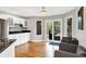 Bright kitchen and breakfast nook with stainless steel appliances and a sliding door to the deck at 826 N Lanyard Dr, Cicero, IN 46034