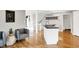 Bright kitchen and breakfast nook with stainless steel appliances, granite counters, white cabinets, and an island at 826 N Lanyard Dr, Cicero, IN 46034