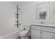 Bathroom featuring a shower and tub combo, single sink vanity, and modern fixtures at 848 Holmdale Dr, Indianapolis, IN 46239