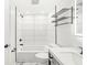 Contemporary bathroom featuring a sleek vanity, tub-shower combo, and modern fixtures at 911 Eastern Ave, Indianapolis, IN 46201