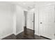 Neutral bedroom with an open door at 911 Eastern Ave, Indianapolis, IN 46201