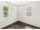 Bright bedroom with hardwood floors and windows at 911 Eastern Ave, Indianapolis, IN 46201