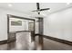 Beautiful living room with hardwood floors, modern lighting, and an open layout, perfect for gatherings at 911 Eastern Ave, Indianapolis, IN 46201
