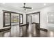Spacious living room with beautiful hardwood floors, stylish lighting, and an open layout for entertaining at 911 Eastern Ave, Indianapolis, IN 46201