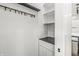 Mudroom with built in shelving, countertop and closet at 911 Eastern Ave, Indianapolis, IN 46201