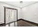 Bright room featuring stylish french doors leading to outdoor space, perfect for relaxation or a home office at 911 Eastern Ave, Indianapolis, IN 46201