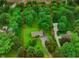 Sprawling acreage featuring mature trees and serene landscaping for a private and tranquil setting at 9378 N County Road 75 W, Lizton, IN 46149