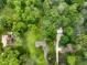 Lush, green neighborhood showcasing tree-lined properties and well-maintained homes from above at 9378 N County Road 75 W, Lizton, IN 46149
