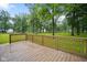 Large wooden deck area with wooded perimeter provides a peaceful outdoor retreat at 9378 N County Road 75 W, Lizton, IN 46149