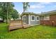 Exterior showing a deck area leading to an addition with windows and siding at 9378 N County Road 75 W, Lizton, IN 46149
