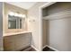 Neutral bathroom with a closet and vanity featuring a light-colored countertop at 9378 N County Road 75 W, Lizton, IN 46149